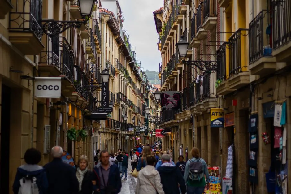 Elaborate pintxos lined up on a bar counter in San Sebasti&aacute;n