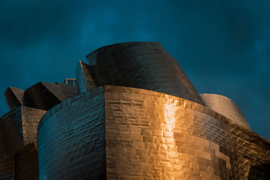 Titanium-clad curves of the Guggenheim Museum reflected in the river