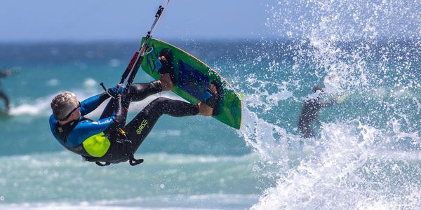 Surfer skillfully rides a powerful wave at Jeffreys Bay, South Africa