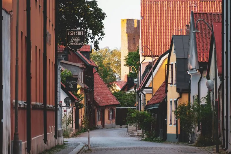 Medieval stone wall of Visby on Gotland with towers against a blue sky