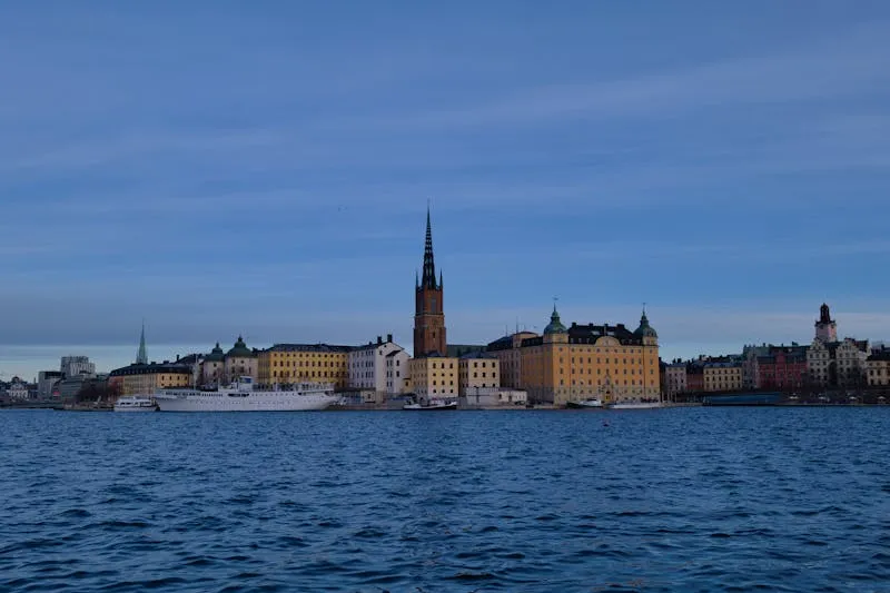 Stockholm waterfront with colourful buildings of Gamla Stan reflecting in the water