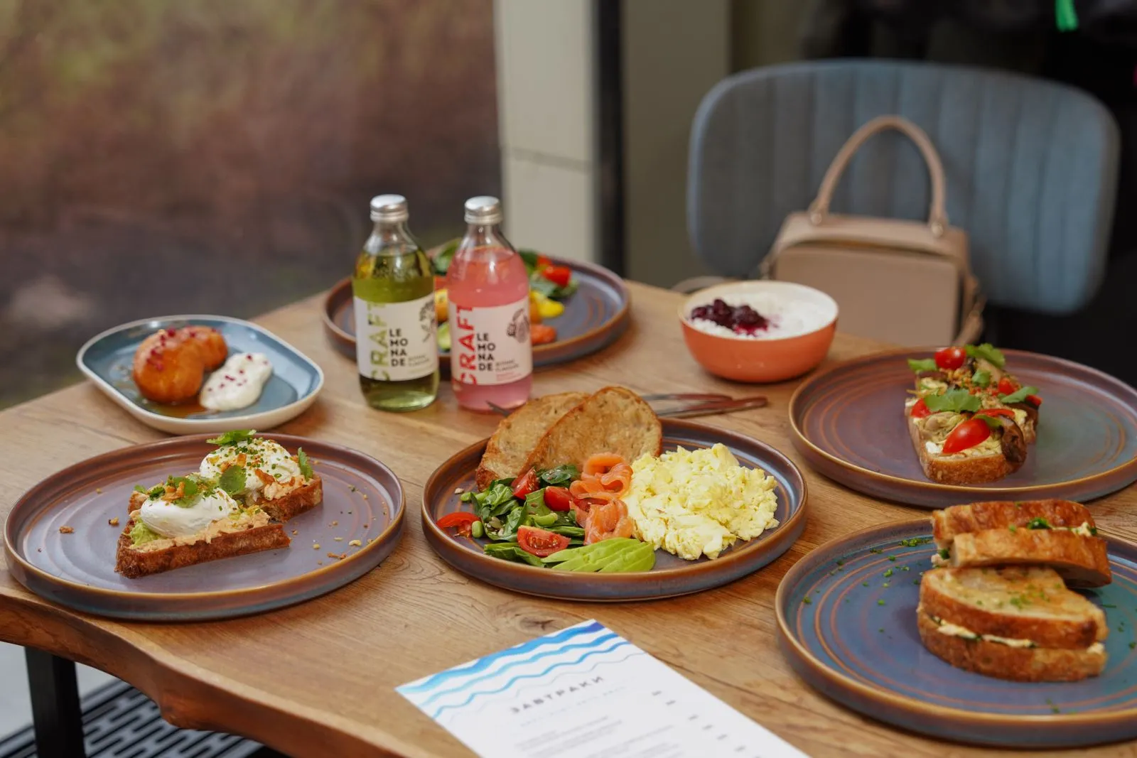 Swedish food spread with salmon, bread and fresh ingredients on a table