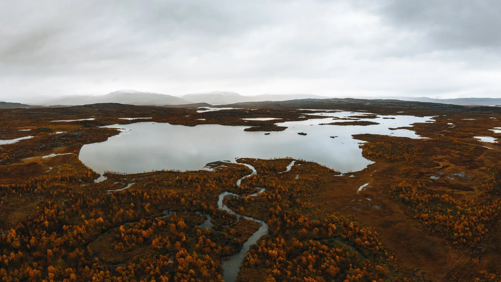 Aerial view of Swedish landscape showing forests, lakes and islands