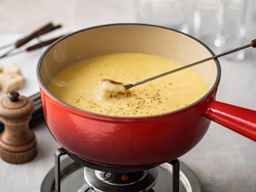 Fondue and cheese wheels
