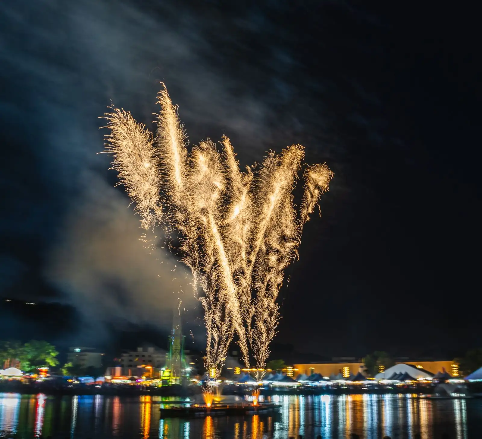 Fireworks over a Swiss lake celebrating National Day