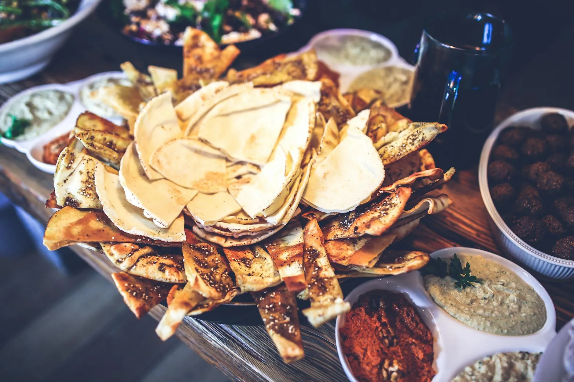 Colourful spread of Emirati and Middle Eastern dishes on a table