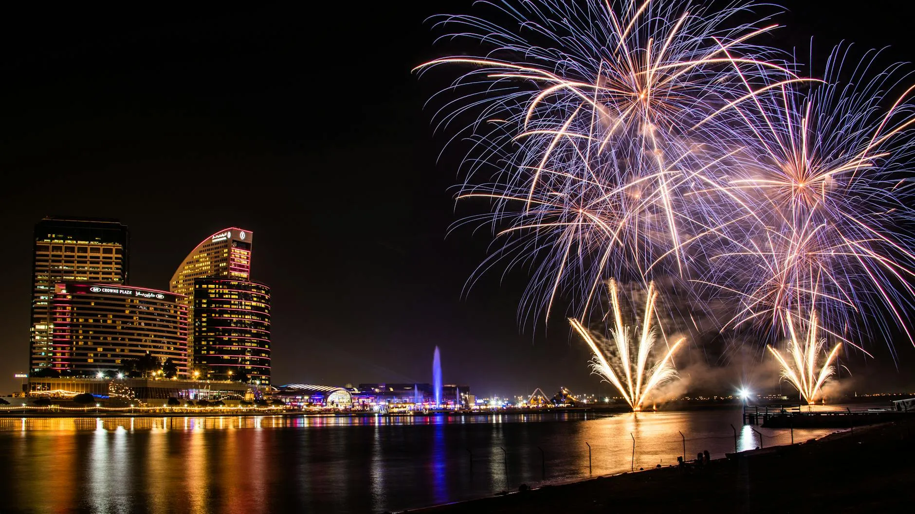 Fireworks illuminating a night skyline during a UAE celebration