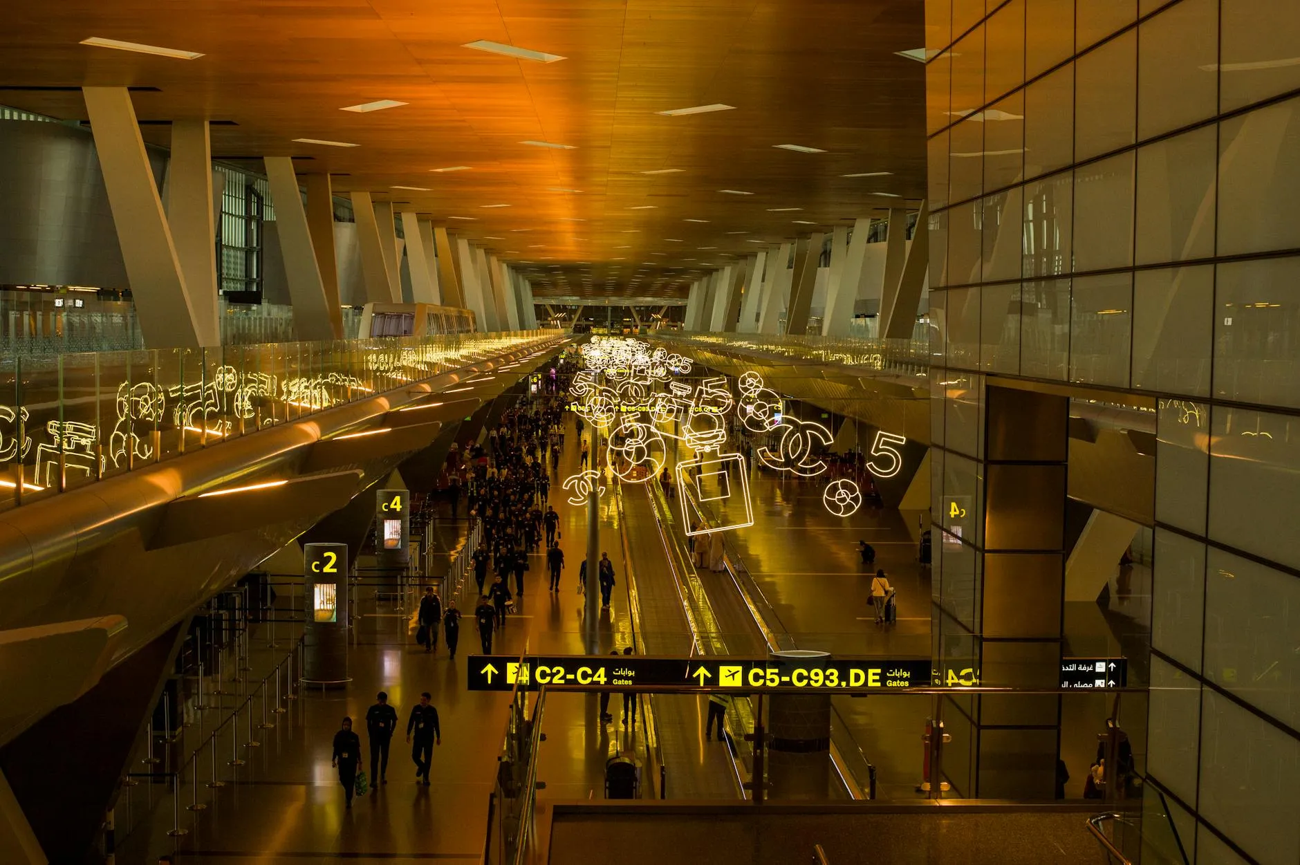 Modern Dubai airport terminal with travellers