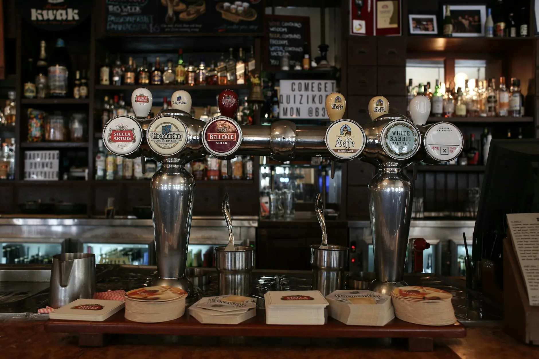 Traditional British pub interior with dark wood and real ale taps