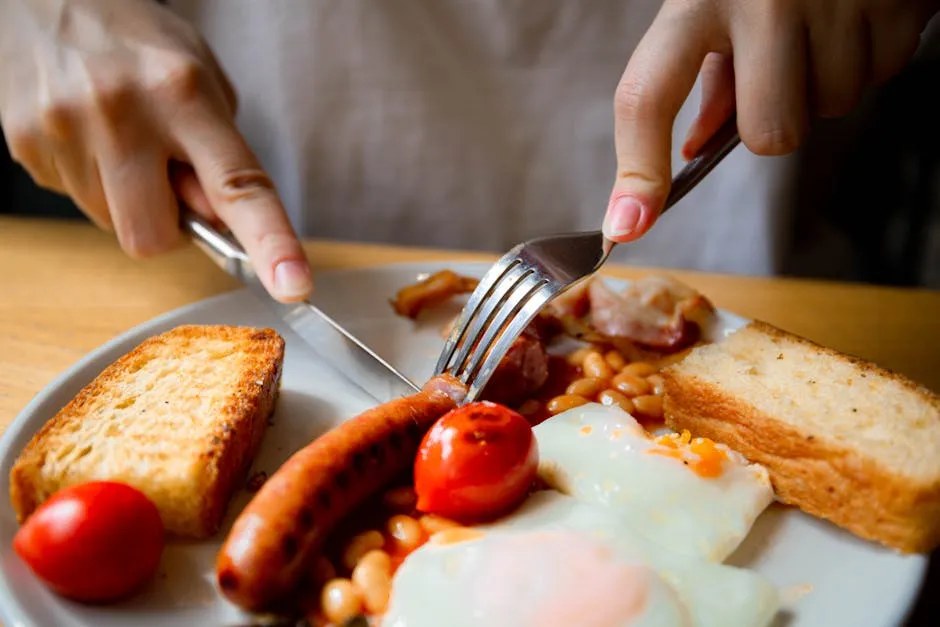 Full English breakfast with bacon, eggs, sausages, beans and toast