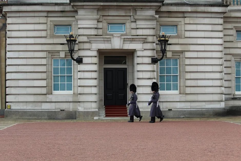 Buckingham Palace with guards in bearskin hats during the Changing of the Guard
