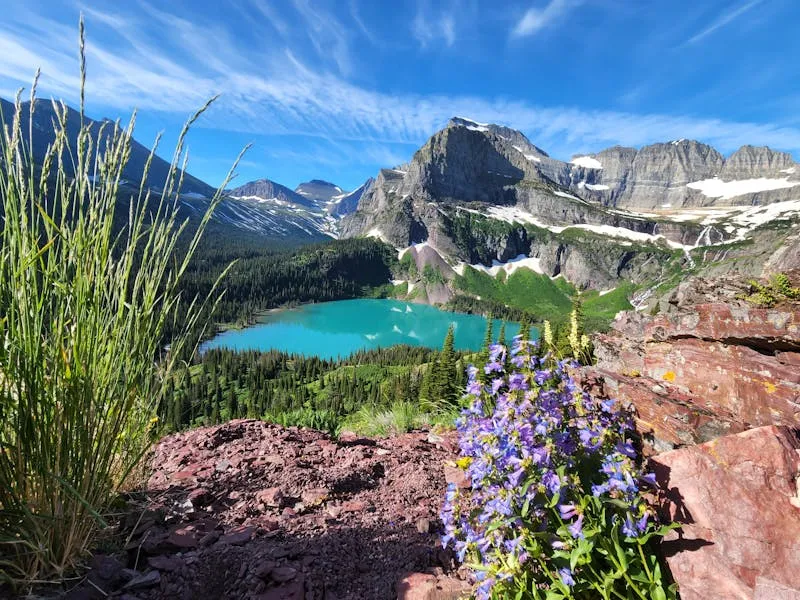 Glacier National Park turquoise lake surrounded by mountain peaks