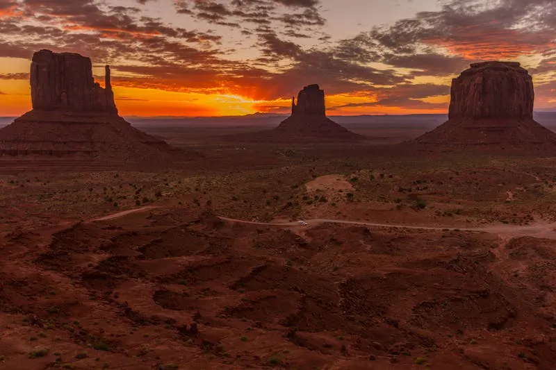 Sandstone buttes of Monument Valley at sunrise