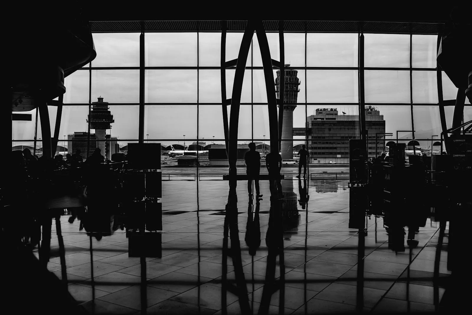 Airport arrivals terminal with international travellers