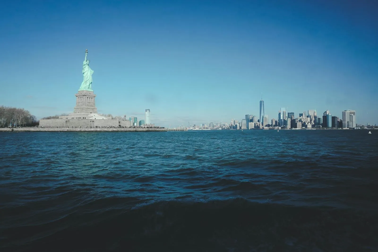 Statue of Liberty with Manhattan skyline in the background