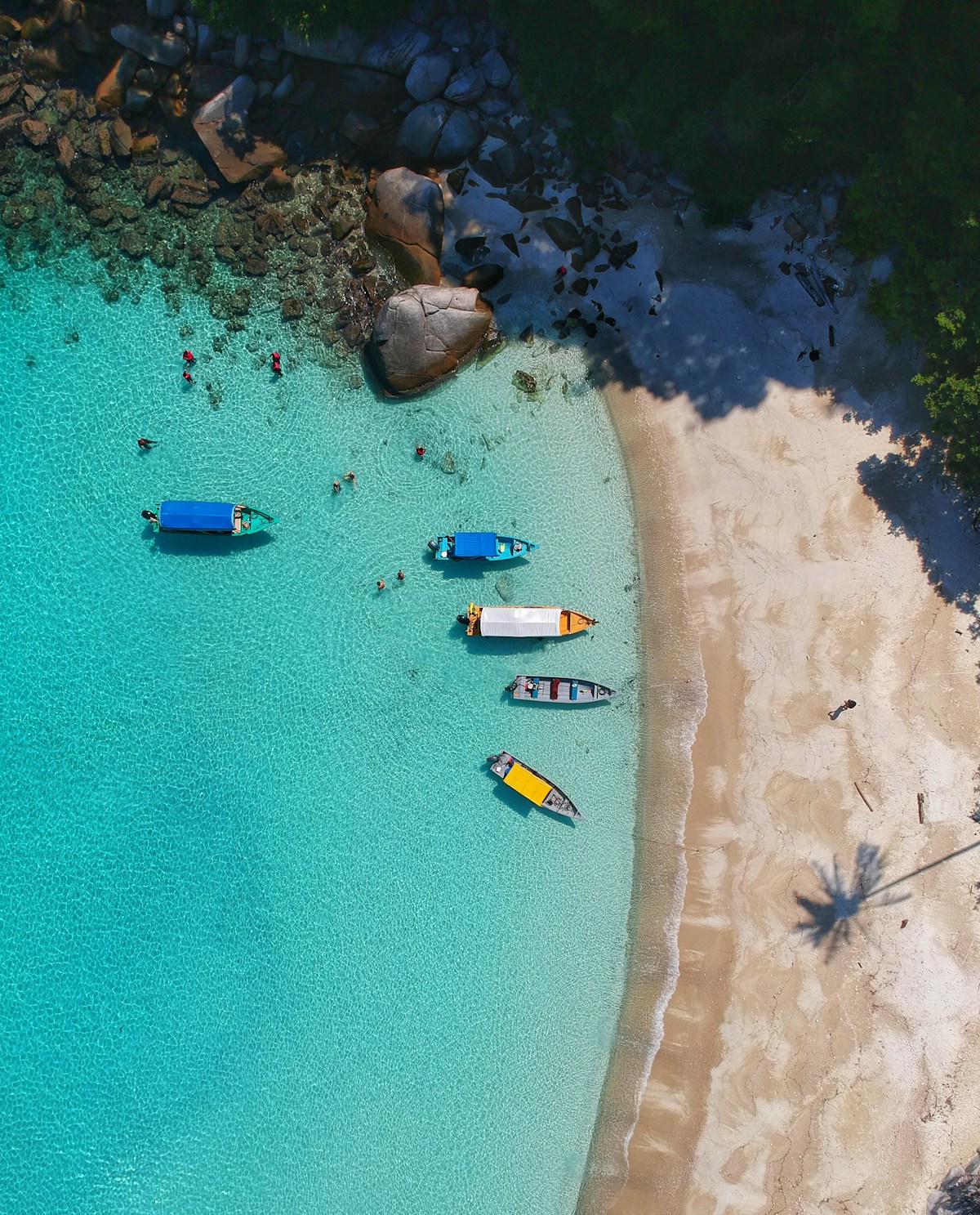 Aerial view of boats on turquoise waters at Perhentian Islands