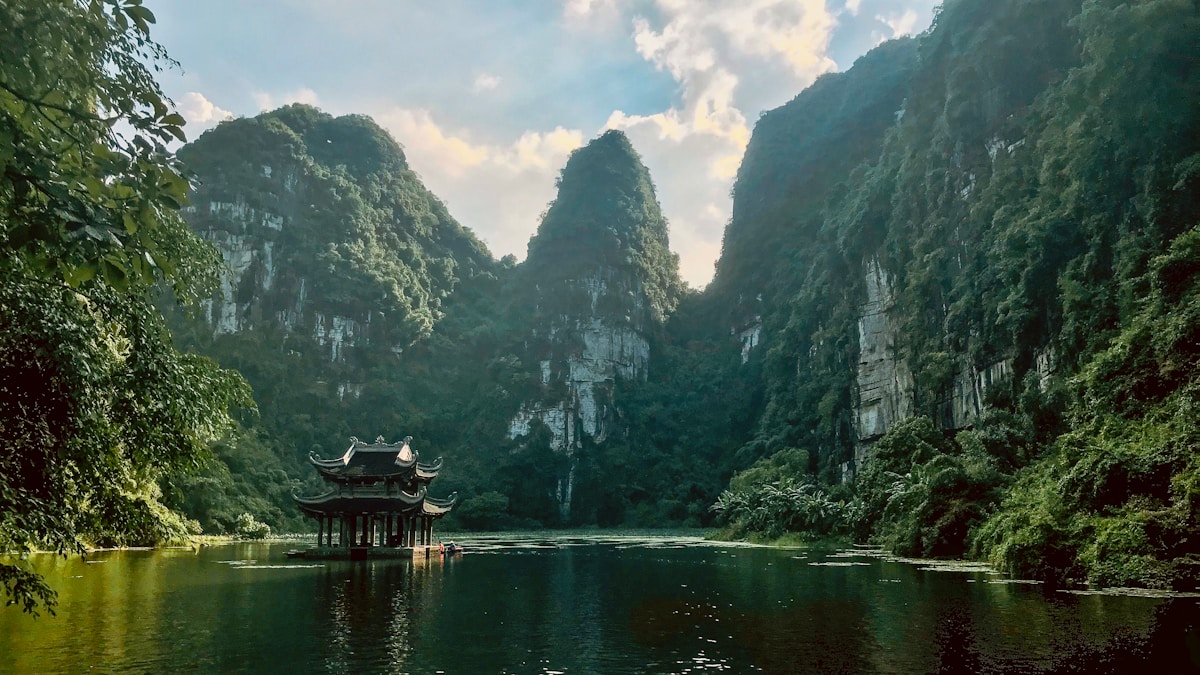 Boat ride through karst mountains at Trang An, Ninh Binh